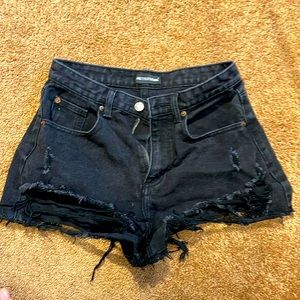Black shorty shorts. Never worn.